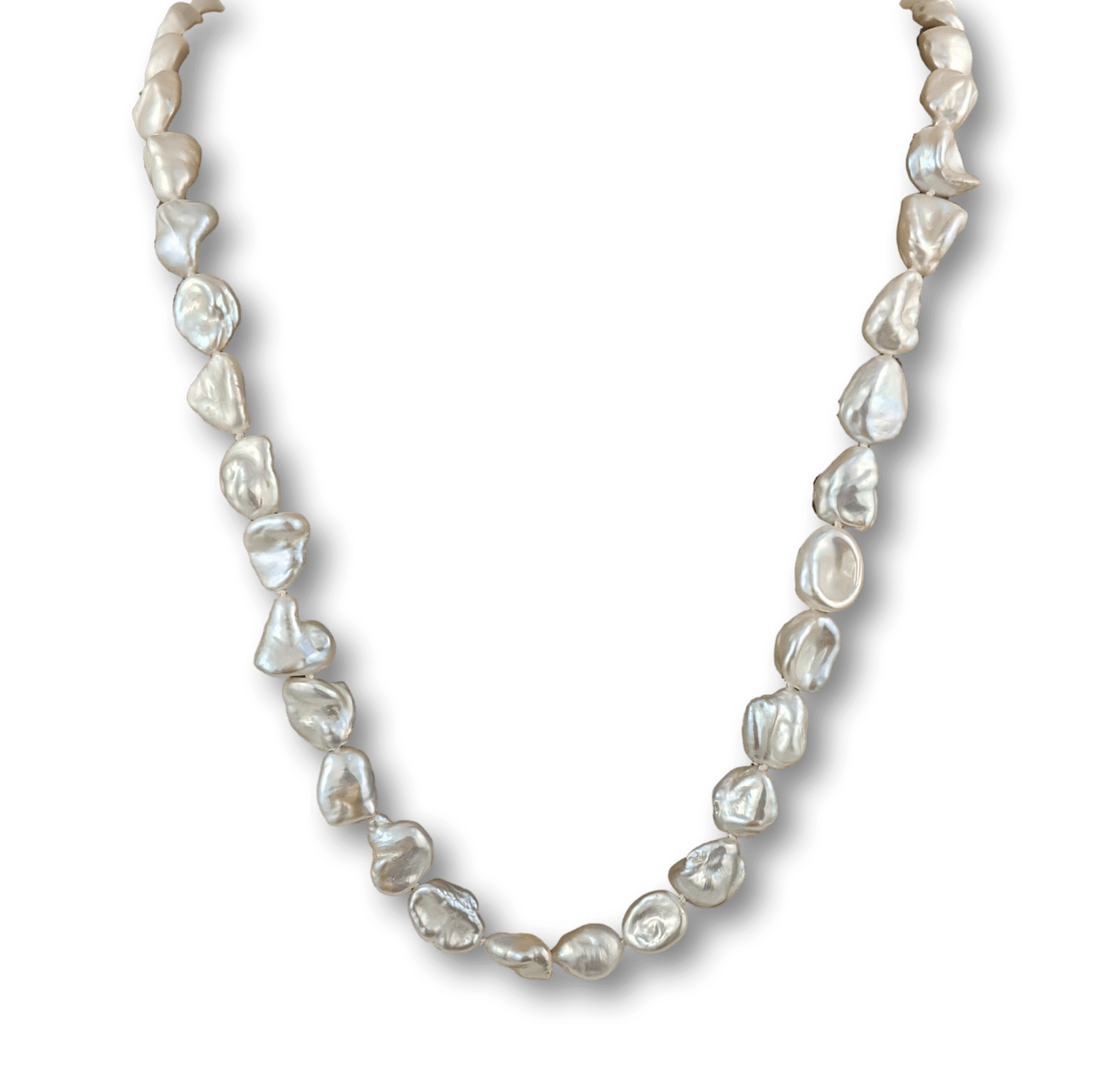 Strands Pacific Pearls  Blushing Ice Chinese Freshwater Keshi Pearls —  Pearlneckla