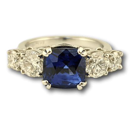 Sapphire & Four Diamond Ring